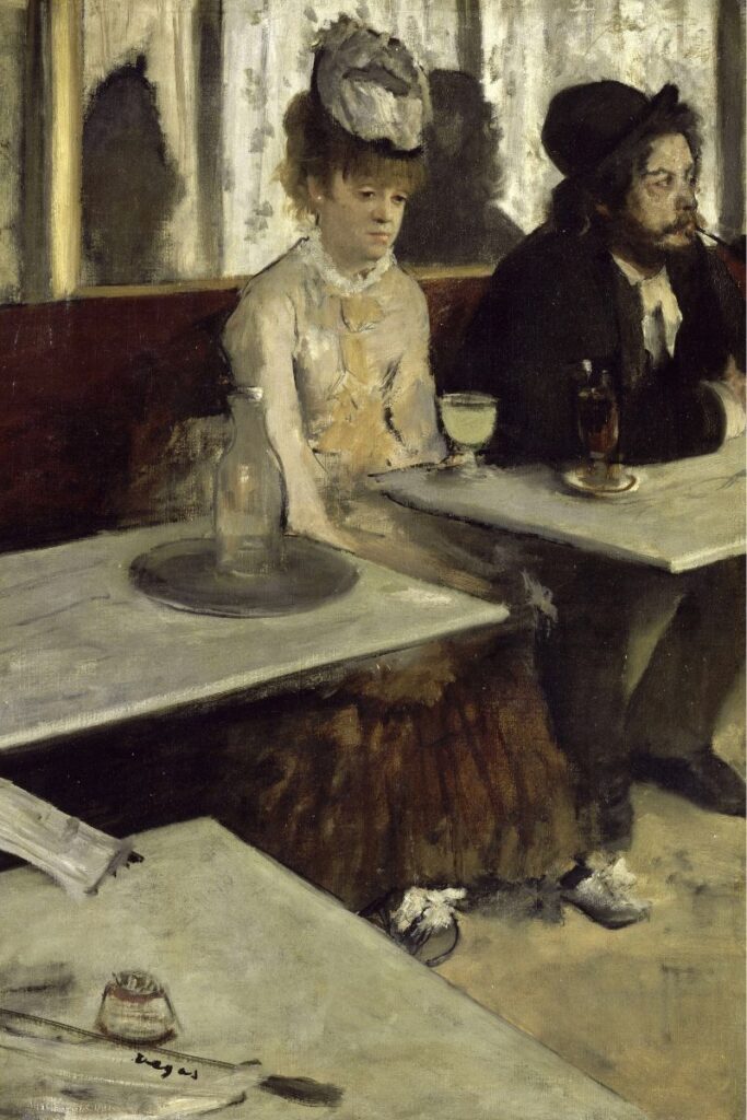 El cuadro 'La absenta' de Edgar Degas muestra a una mujer con la mirada perdida. Está sentada frente a una mesa con una copa de absenta. Está con un hombre que, por el aspecto, parece un artista bohemio de la época. 
